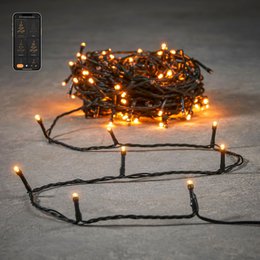  Warm white plastic Christmas tree lighting with string of lights.