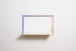Fläpps Wall Desk/Secretary 80x50-1 - Sunrise by Joa Herrenknecht. Minimalist wall-mounted desk with colorful gradient frame, providing a compact and versatile storage solution.