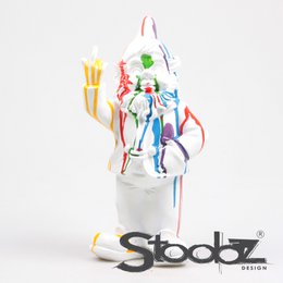  Colorful abstract statue with bold, expressive design featuring vibrant splashes of paint. Unique, modern art piece with an eye-catching, playful aesthetic.