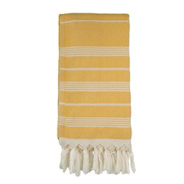 A yellow and ivory striped hammam towel with tassels.