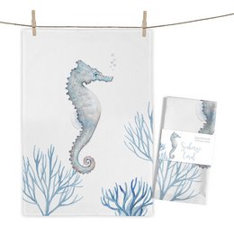 Seahorse-themed tea towel featuring a watercolor illustration of a seahorse surrounded by coral and seaweed in shades of blue and gray.