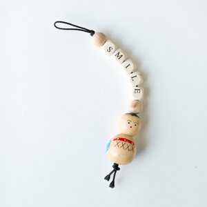 Anhängendes Lächeln