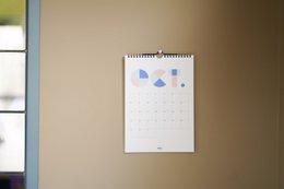  A3 size birthday calendar in English with simple geometric design.