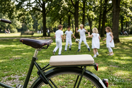 "Beige linen rectangular bike rack cushion, universal fit, soft textile material for comfortable seating"