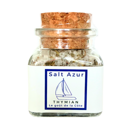  Thyme salt in a glass jar with a blue label. The salt contains natural ingredients and is packaged in a glass container.