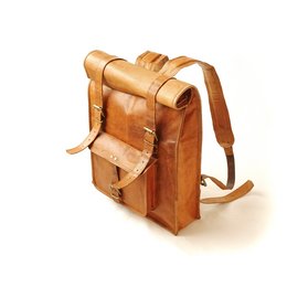 A large, brown leather backpack with a rolltop closure and adjustable straps. The backpack has a vintage, rugged appearance and appears to be suitable for outdoor activities or travel.