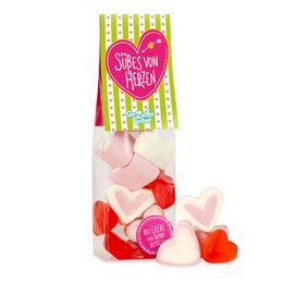 Assorted heart-shaped candies in a festive package. Includes a variety of pink, red, and white marshmallow and gummy candies. Perfect for Valentine's Day or any occasion to share the love.