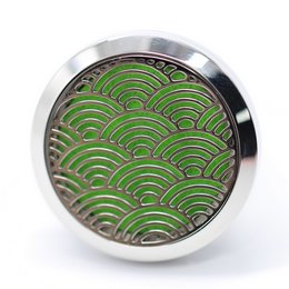 Stainless steel car diffuser with decorative green wave pattern, designed for aromatherapy and as a gift idea.