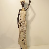 Traditional African lady with pot