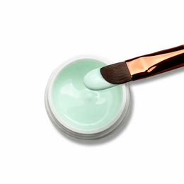 Mint green no-wipe gel nail polish in a 5ml jar with a gold lid. Suitable for manicure sets.