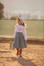 Petrol blue muslin skirt for girls aged 2-7 years, featuring a simple, classic design with a comfortable, flowing silhouette.