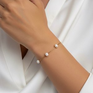 ADORÉ - Gold plated steel bracelet with freshwater pearls