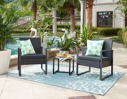 Outdoor seating group with 2 wicker chairs and a side table, suitable for garden or patio use.