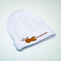 White baby hat with orange hand print design. Made of soft, breathable material. Suitable for infants and toddlers.