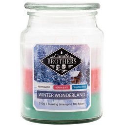 A large, round, glass candle jar with a white wax candle and a label that says "Winter Wonderland". The candle is scented and part of the "Brothers" brand.