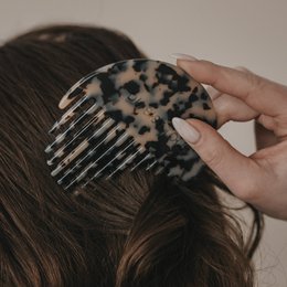  Leopard print hair clip with 10 pieces. Stylish accessory for hair.