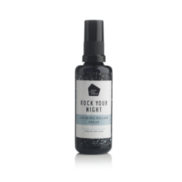 A calming pillow spray made with essential oils to help promote sleep. The spray bottle is black with a simple label design.