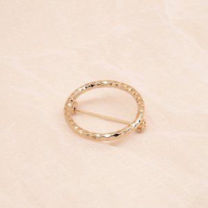 CLASH brooch