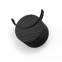 A round, black wall hook with deer-like antlers. Made of wood with a textured, grain-like pattern. Suitable for hanging coats, bags, or other items.