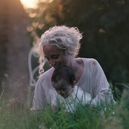  Soft, comfortable cotton baby shirt in a neutral color, available in sizes 9M to 4Y.