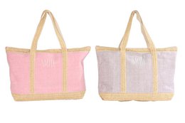 A large, lightweight tote bag made of polyester and cotton. The bag features a simple, minimalist design with a beige and pink color scheme. The bag has a roomy interior and sturdy handles for easy carrying.