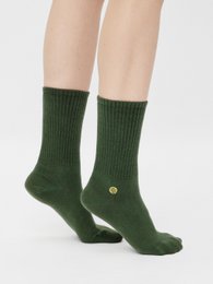 Green retro-style socks with embroidered logo, made of organic materials.