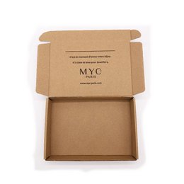 Shipping box with MYC-Paris logo, made of brown cardboard material, rectangular in shape.
