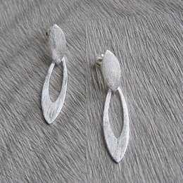 Silver oval-shaped statement earrings
