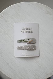 Barrettes fleur de lin naturel+pois
