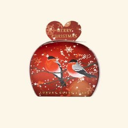 Heart-shaped soap set in a festive red and white box with a "Merry Christmas" message and a bird design. The soap is 3 pieces of 20 grams each.