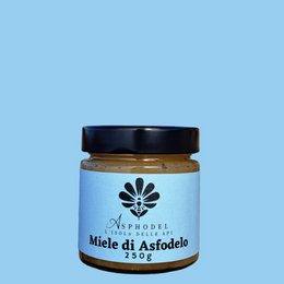 Asphodel Honey - 100% Sardinian Raw Honey - Natural - 250g. A jar of natural, raw honey from Sardinia, Italy. The honey has a golden color and is packaged in a glass jar with a black lid.