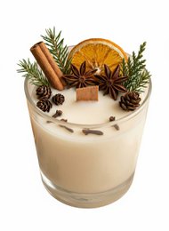  Cream colored cylindrical candle with dried orange slices, cinnamon sticks, star anise, and rosemary sprigs. Winter spiced scent.