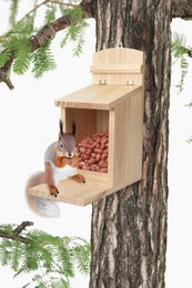  Wooden birdhouse with a simple, minimalist design. Features a natural wood finish and a small circular entrance hole for birds.