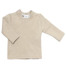 Beige wrap-style baby shirt with a waffle texture. Made of soft, comfortable material suitable for infants and toddlers. Features a wrap-around design for easy dressing.