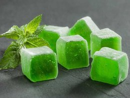 Fresh mint-flavored Turkish delight candies in a vibrant green color, with a soft, chewy texture.