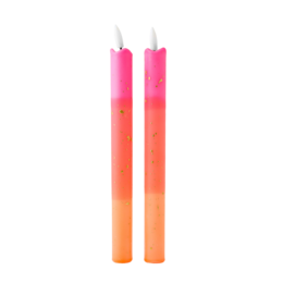  Two tall, cylindrical LED pillar candles in a pink and gold color with a flickering flame. The candles have a decorative, speckled pattern and are mounted on a mint green base.