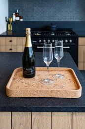  "Rectangular serving tray, natural cork material, minimalist design, 42x32.5cm, elegant entertaining"