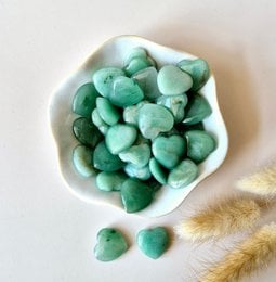  Green heart-shaped aventurine pocketstones, a natural crystal for worry and meditation. Available in 1, 3, or 10 piece sets.