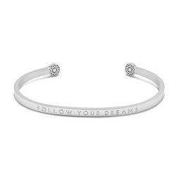 A delicate, open-ended charm bracelet in silver or gold with the engraved message "Follow your dreams". The bracelet features a small floral charm detail at each end.