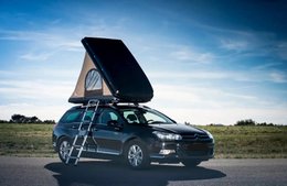  "Black hardtop rooftop tent, 2-person capacity, car-mounted camping shelter, premium French design"