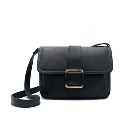 Black leather shoulder bag with gold-tone buckle detail and adjustable strap.