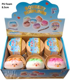  Colorful dumpling-shaped PU foam slow rising squishy toys, round soft stress relief fidget toys, pastel pink peach colors.