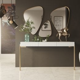 A modern console table with a sleek, minimalist design. The table features a white, striped top and a metal frame in a choice of silver, gold, or bronze finishes. The table is available in two sizes, 100x40x80 cm or 120x40x80 cm, to suit different spaces.
