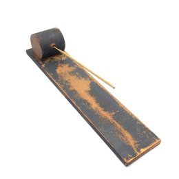 Industrial-style incense holder with a rectangular, elongated shape and a rustic, distressed finish in shades of brown and orange.