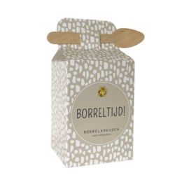 A small white box with the text "Borrelltijd" printed on it, suggesting a herb butter or spice mix product. The box has a simple, minimalist design with a black and white color scheme.