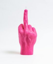 Vibrant pink candle in the shape of a hand giving the middle finger gesture. Suitable for a humorous or irreverent home decor or gift.
