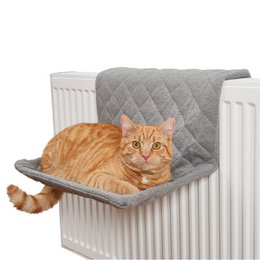 Cozy gray quilted cat lounger with a plush, comfortable bed for pets. Ideal for keeping cats warm and relaxed.