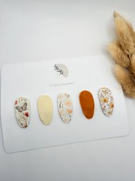  Set of anti-slip hair clips in various spring-inspired colors and patterns, including floral, polka dot, and solid designs.