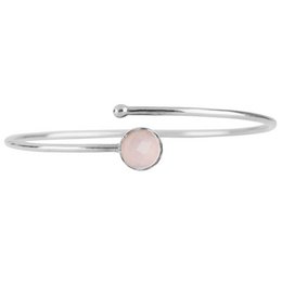 Silver bracelet with rose quartz charm, suitable for children.