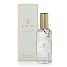  Boutique Roomspray Lily & Green Tea 100ml grijs, a floral and herbal room spray with notes of lily and green tea, packaged in a clear glass bottle with a gold cap.
